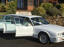 White 6 door Daimler for weddings in Worthing